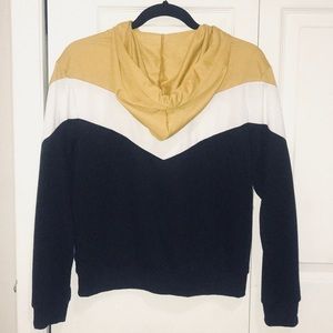 Mustard,white,and black hoodie.